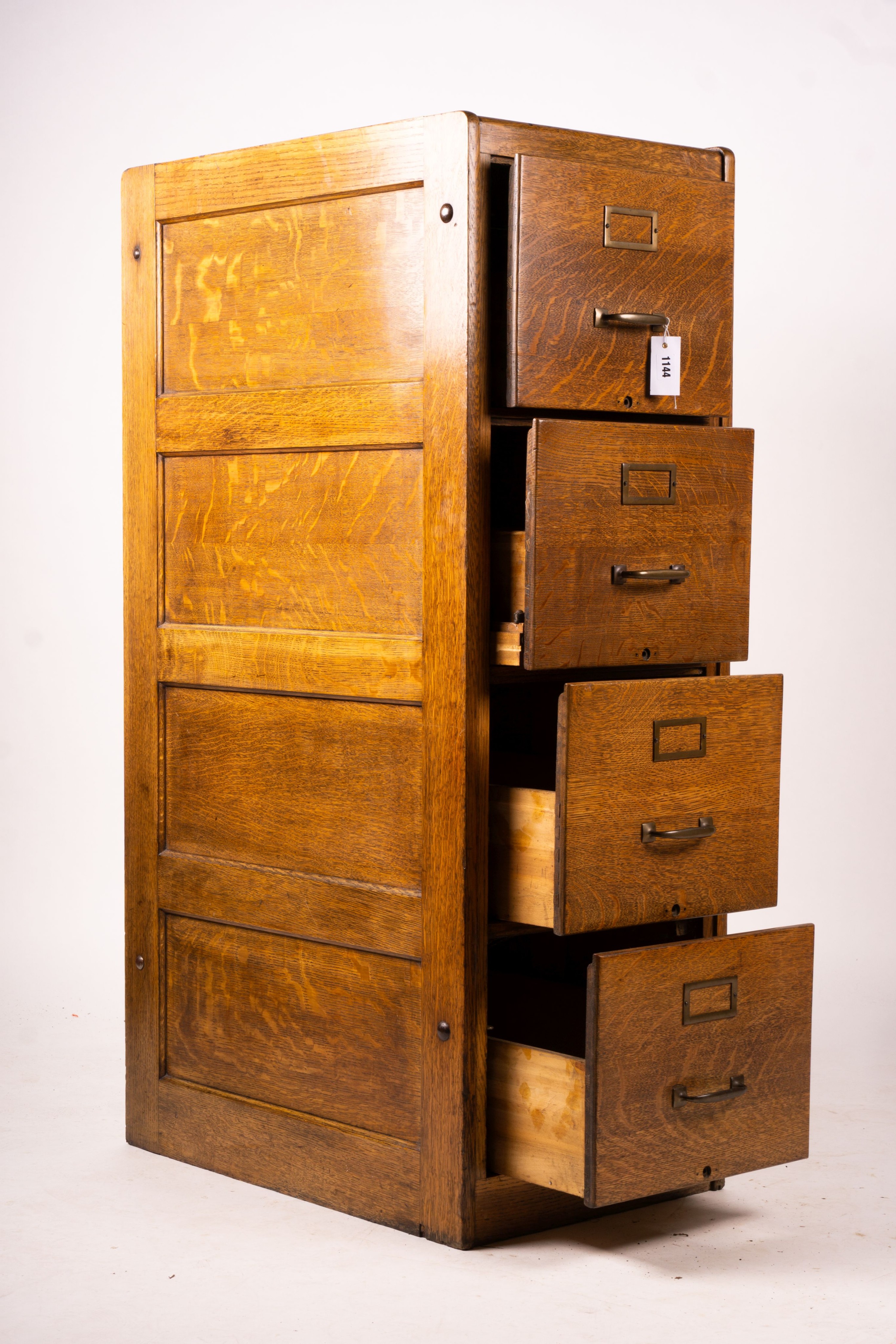 An early 20th century oak four drawer filing cabinet, W.44cm D.70cm. H.132cm